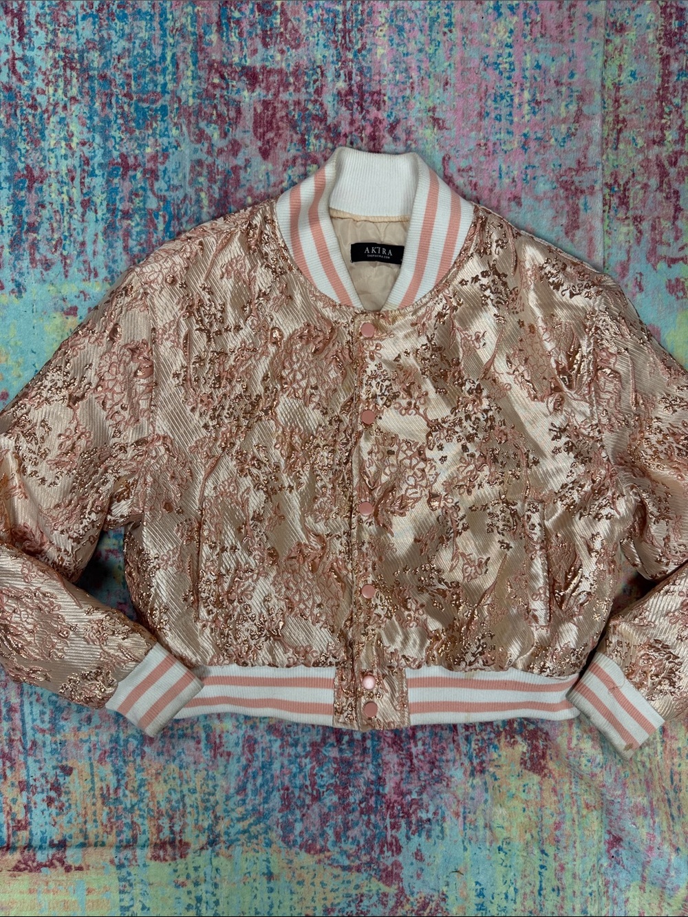 AKIRA Rose Gold Metallic Bomber Jacket with Blush Trim